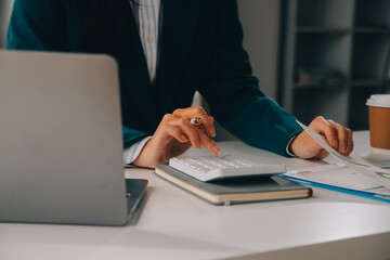 Thinking about how to take the business to technological heights. Cropped shot of an attractive young businesswoman working in her office.