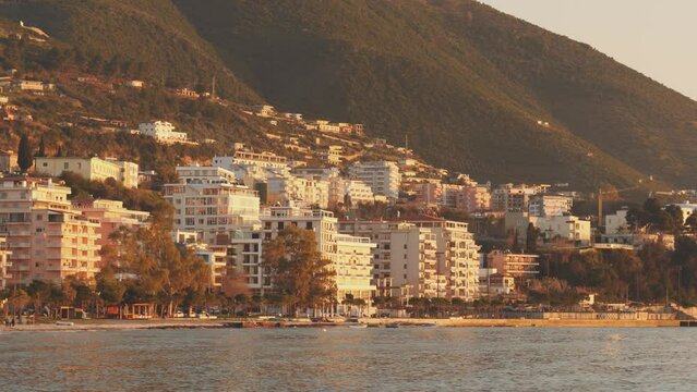 Coastal Scene with Vlora CItyscape at Sunset, Albania, Holiday Destination, Pan