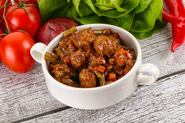 Meatball with vegetables and spices