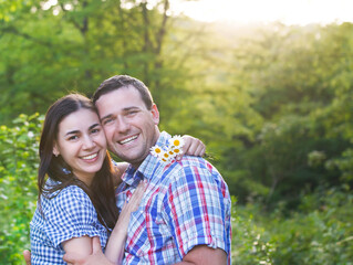 Obraz premium Young happy couple in love in spring day