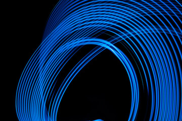 Abstract background neon electric blue glowing lines. High quality photo