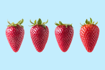 Strawberry isolated on blue background. Minimal food concept.