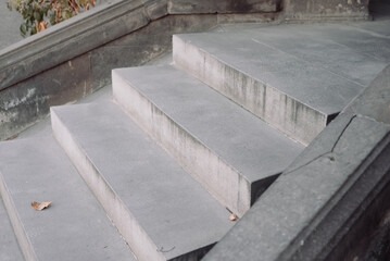 Staircase to an old building. Shoe marks on the steps.