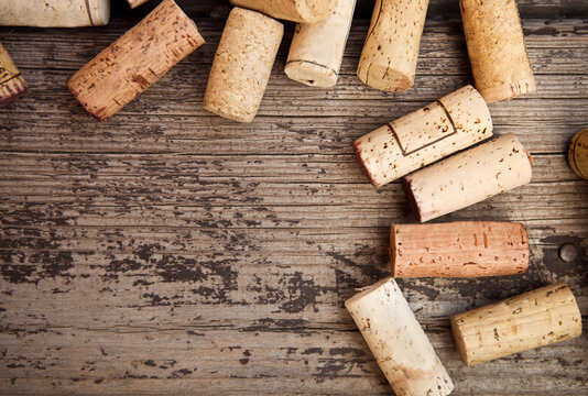 Dated wine bottle corks on the wooden background