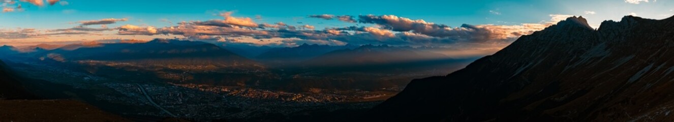 High resolution stitched alpine sunset or sundowner summer panorama at the famous Nordkette...
