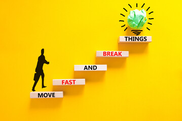 Move fast and break things symbol. Concept words Move fast and break things on wooden blocks....