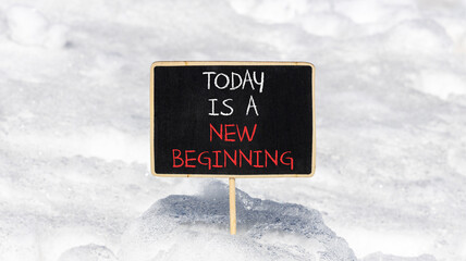 Today is a new beginning symbol. Concept words Today is a new beginning on beautiful blackboard....