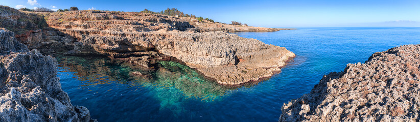 The most beautiful Apulian coast in Italy: Cala Corvino. Typical coastline near Monopoli : high and...