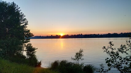 sunset on the river bank
