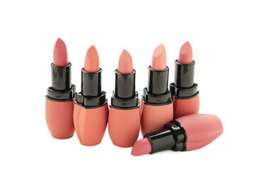 Many different lipsticks isolated on white background