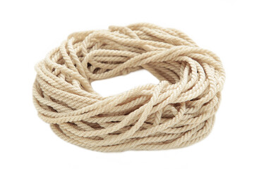 Coil of rope isolated on a white background close up