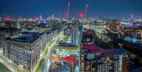 Leeds city centre aerial view at night with construction work at Wellington Street building new offices and apartments