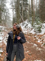woman in winter forest