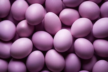 Foto op Plexiglas  a pile of purple eggs sitting next to each other on top of a pile of other purple eggs on top of a pile of other purple eggs on top of each other. © Shanti