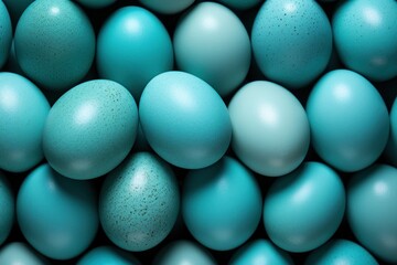  a pile of blue and white eggs with speckled eggs in the middle of the image and a blue egg in the middle with speckled eggs in the middle of the image.