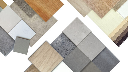 top view of interior material samples board including artificial stones, wooden tiles, concrete vinyl flooring tile, drape catalog, fabric isolated on background with clipping path.