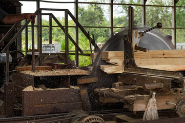 Steam Powered Sawmill Saws Through Wood Making Sawdust Fly
