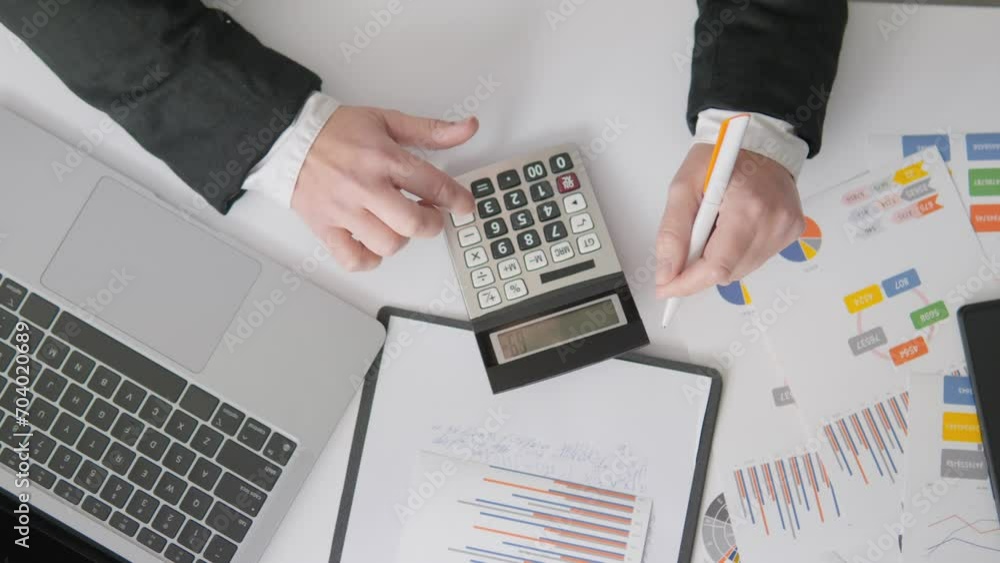 Poster A girl accountant is focused on compiling financial reports and manages the accounting of expenses and profits on a calculator. An economist makes calculations and analyzes financial indicators using