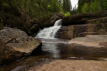 waterfalls on a stream in the forest