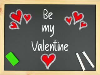 Blackboard with the words Be my Valentine written in white, red hearts with two chalks and a green eraser
