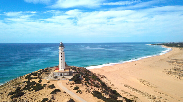 Faro de Trafalgar, aerial view of the lighthouse at a sandy headland with dunes between Los Ca&ntilde;os de Meca and Zahora, Conil de la Frontera, Vejer de la Frontera, Costa de la Luz, Andalusia, Spain