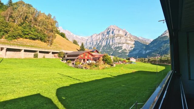 beautiful scenery of switzerland grindelwald from a train inbound to grindelwald. train journey