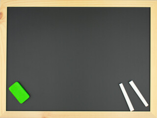 A Blackboard with two chalks and a green eraser