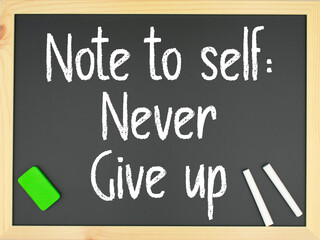 Blackboard with the words note to self: never give up written in white with two chalks and a green eraser