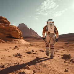 Foto op Aluminium Astronaut in a red desert landscape © duyina1990