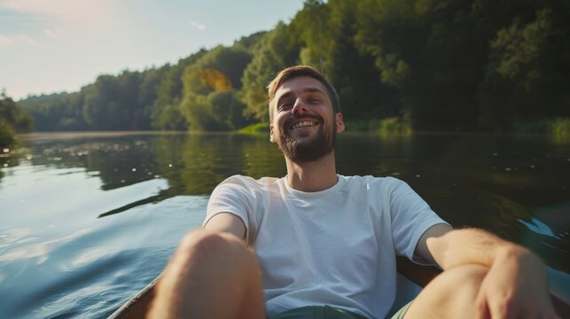 Happy man sit in boat in nature landscape thinking and imagining. Smiling guy relax in ship sailing in river dreaming and visualizing