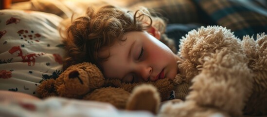 Child peacefully resting with stuffed animal.