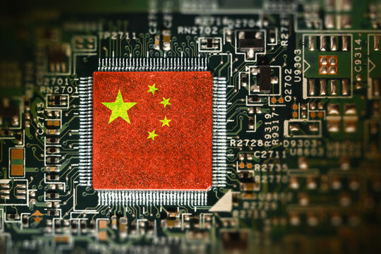 Flag of China on a processor. Computer board with chip. - Powered by Adobe