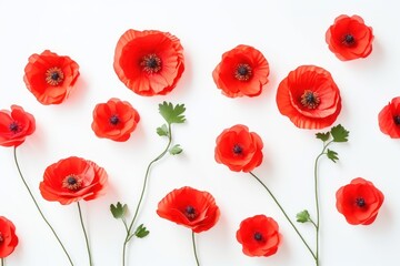  a group of red flowers sitting next to each other on top of a white surface with one flower in the middle and the other in the middle of the flowers.