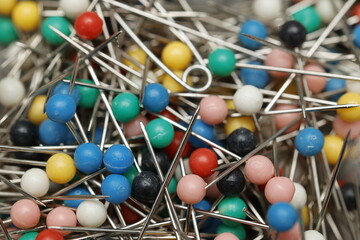 A close-up of a cluster of colorful pushpins