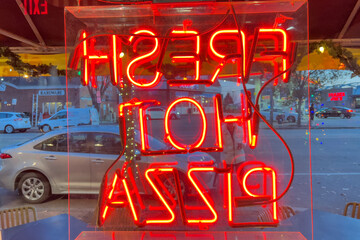 Fresh Hot Pizza sign, neon, backwards