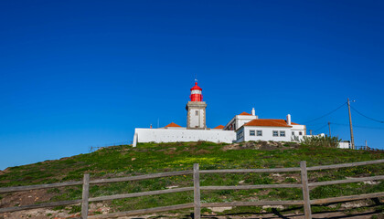 Fototapeta na wymiar Cabo de Roca or Roca cape with the third-oldest lighthouse along the Portuguese coast