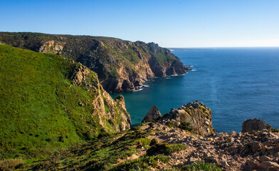 Fototapeta premium Cabo de Roca or Roca cape, most western point of Europe, where the mainland ends and the Atlantic begins, landscape