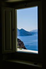 Great view from the a windows of a cliff hotel of Santorini island greece