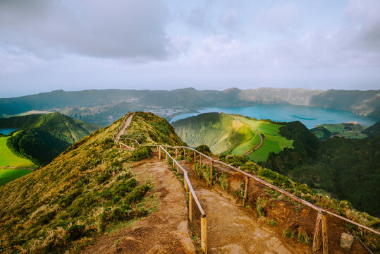 Scenic view from Miradouro da Boca do Inferno to crater lakes of Sete Cidades, Azores, Sao Miguel Island, Portugal. Hiking trail leading to viewpoint
