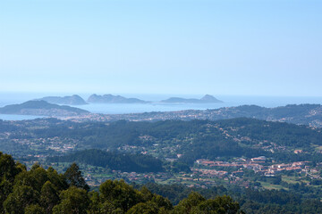 Fototapeta na wymiar The road from Tuy to Gondomar has a spectacular viewpoint where we can see this beautiful panorama of the Cies Islands and the Ría de Vigo