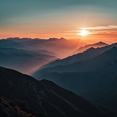 The sun is rising over a mountain range