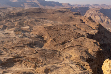 View of the Roman encampment from on Masada of the surrounding area including the Dead Sea in Israel.
 - obrazy, fototapety, plakaty