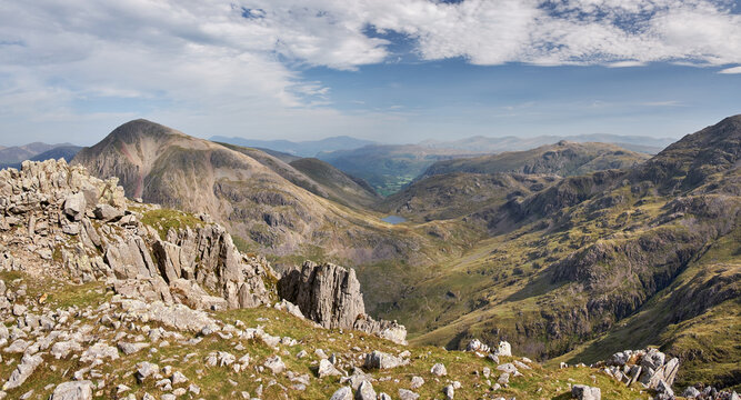 Panorma looking down from the summit of Scafell Pike towards Styhead Tarn and Borrowdale, with the summit of Great Gable on the left, Lake District, UK