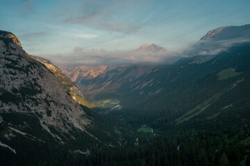 Valley in Karwendel mountains during sunrise in summer from above, Tyrol Austria.