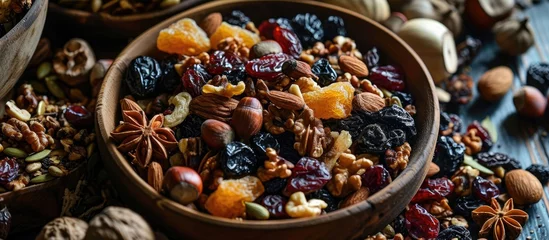 Tuinposter Mix of dried fruit and nutcracker © TheWaterMeloonProjec