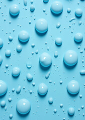 Top view of blue drops pattern on blue background.