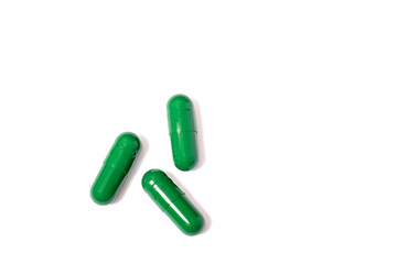 Green Pills isolated on white background. Medical drugs pills. Medical, healthcare, pharmaceuticals concept