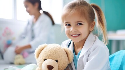 A curly-haired child in a lab coat uses a stethoscope on a teddy bear in a sunlit room.