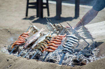 Traditional seafood cooking (espetos) is deeply rooted in Malaga's fishing heritage