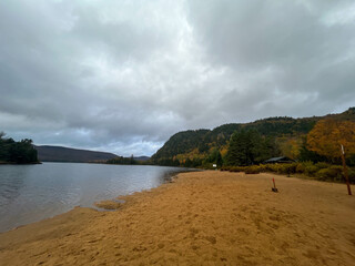 clouds over the lake and beach
